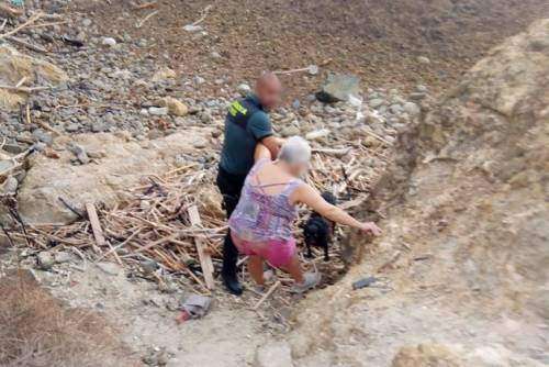 Woman rescued after falling off a cliff while walking her dog