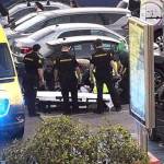 The Guardia Civil stabilises a man after he fainted in a shopping centre in Cartagena.